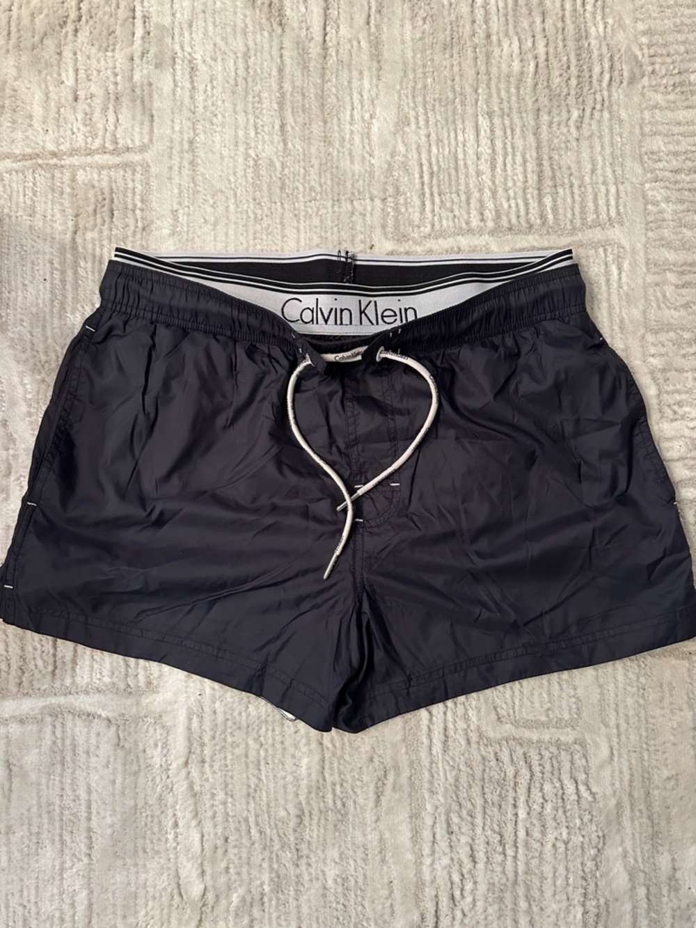 Calvin Klein Men's Black Swim Trunks with White Logo Waistband